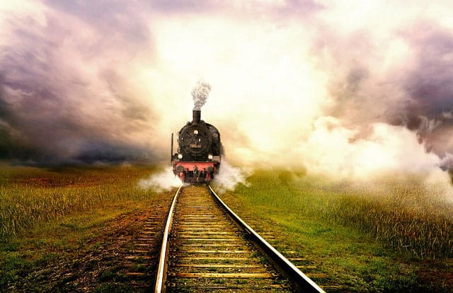 laying track while the train is moving
